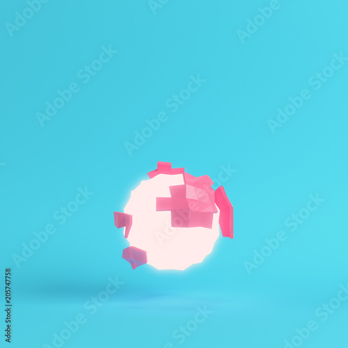 Pink abstract, glowing, low poly planet on bright blue background in pastel colors