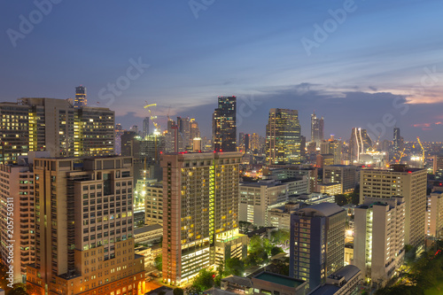 Night cityscape view of Bangkok modern office business building in business zone at Bangkok,Thailand. Bangkok is the capital of Thailand and also the most populated city in Thailand.