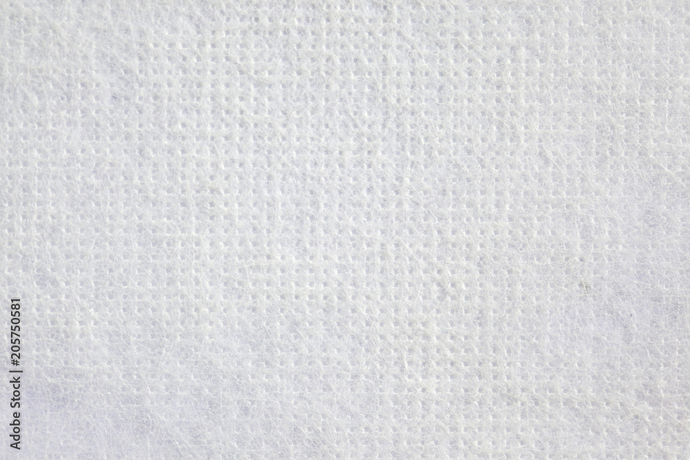 close up of white natural weaver fiber texture on white background. close up of white natural weaver fiber texture on white background.