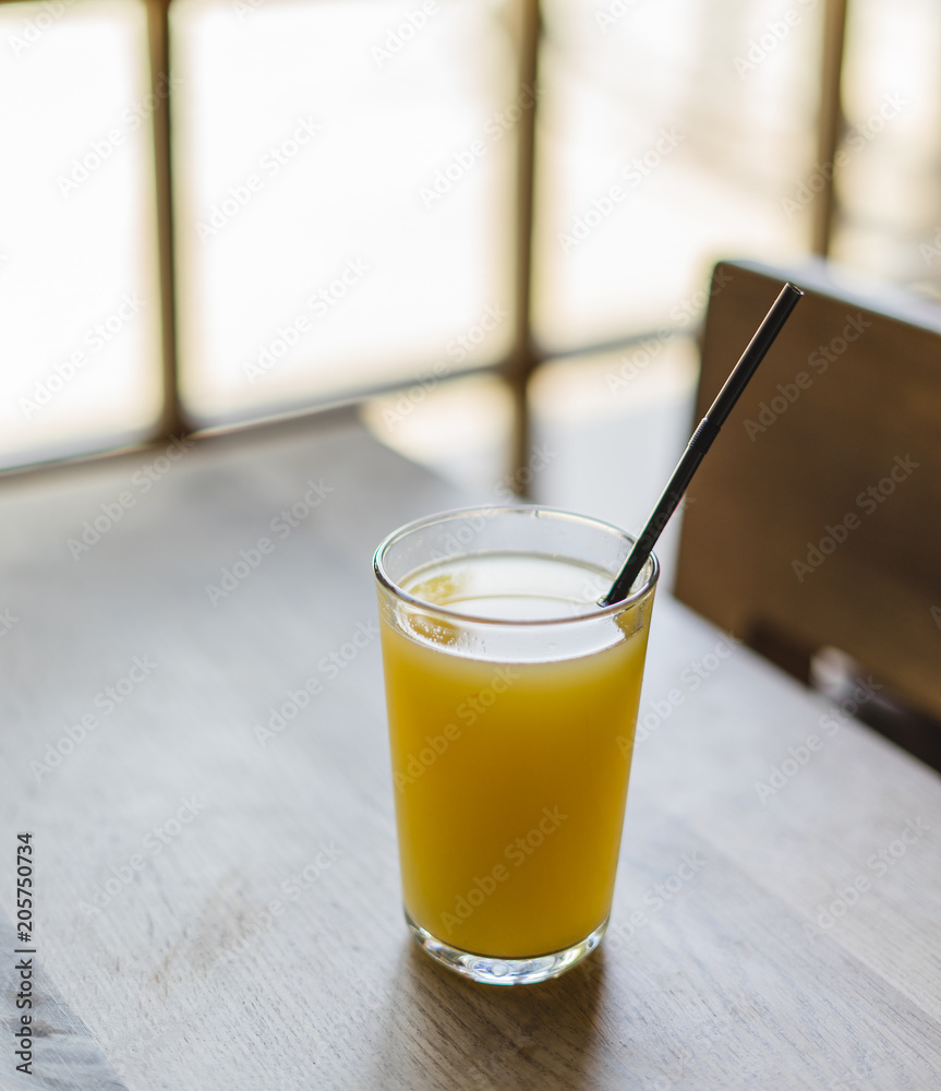 Glass of fresh orange juice.