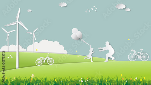 Paper folding art origami style vector illustration. Renewable energy ecology technology concepts, daughter is running to father and holding balloons in green meadow park which full of wind turbine.