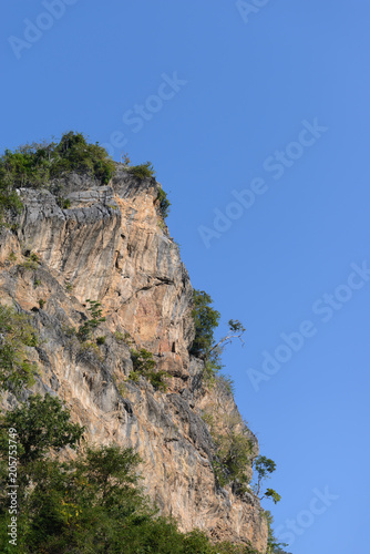 Extremely high mountain cliff for climbing.