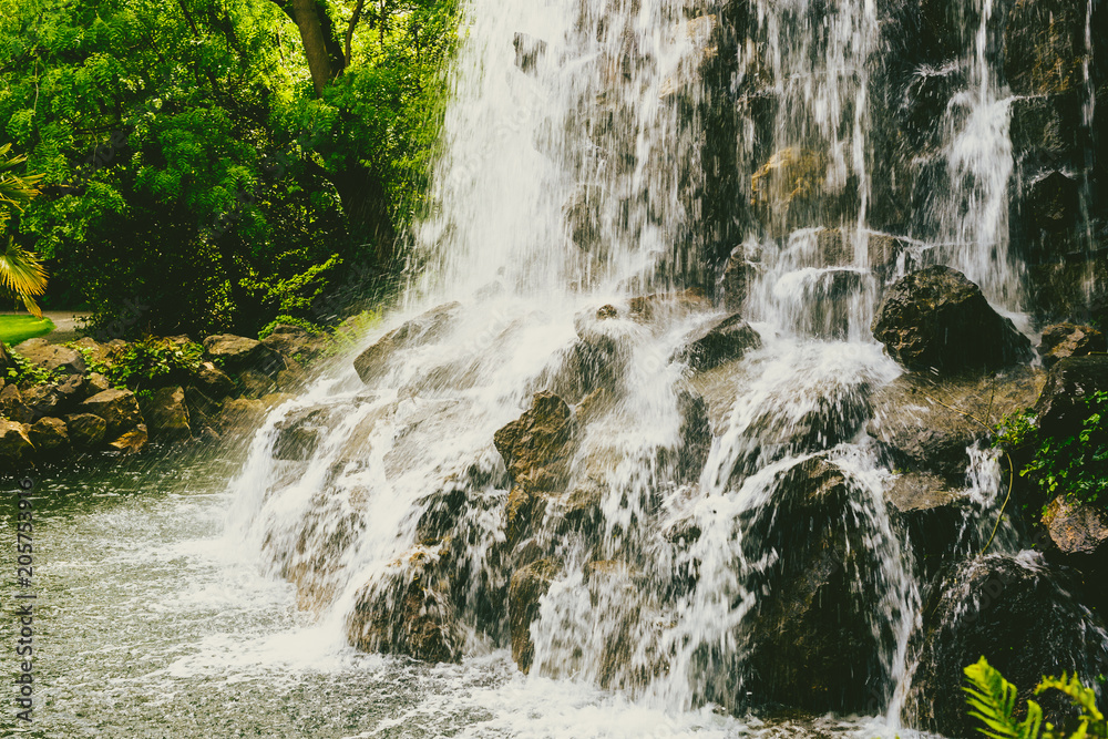 Obraz premium small waterfall in public garden