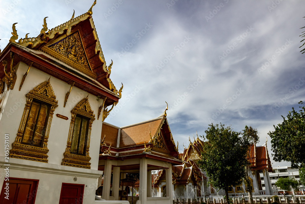 Naklejka premium Wat Benchamabophit (The Marble Temple)Often referred to as the “marble temple” in guidebooks, this architectural gem features a magnificent Buddha image, which is a copy of the highly revered Phra Bud