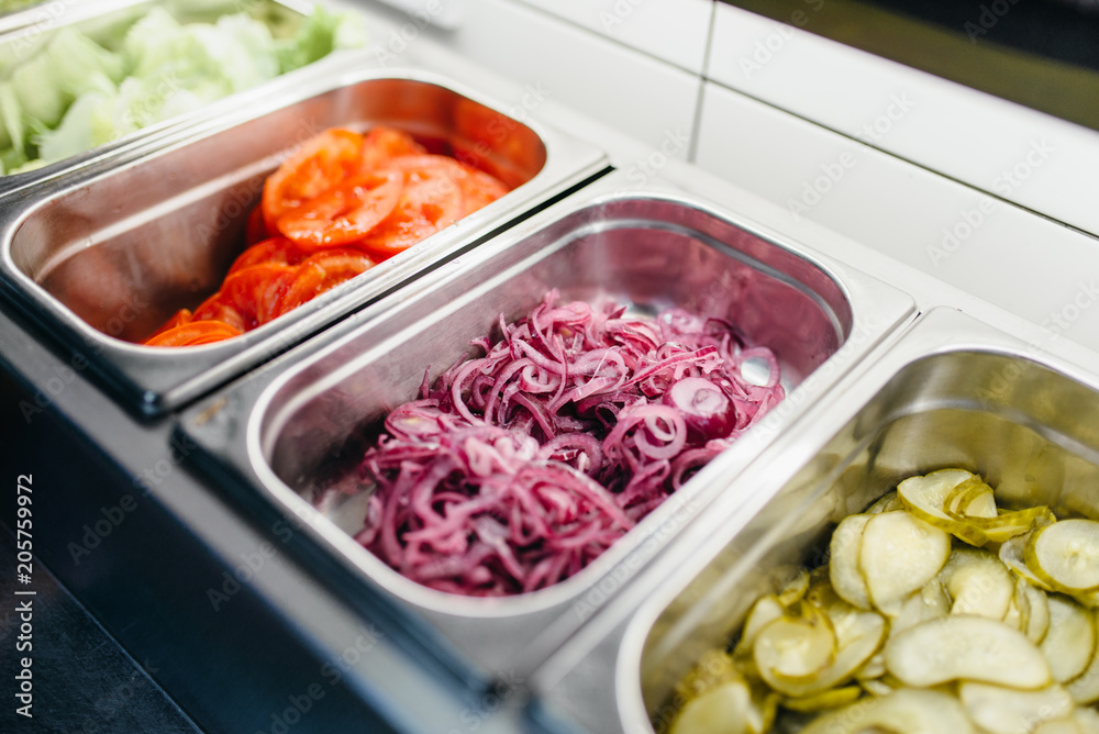 Pallets with fresh vegetables for burger cooking Pallets with fresh vegetables for burger cooking
