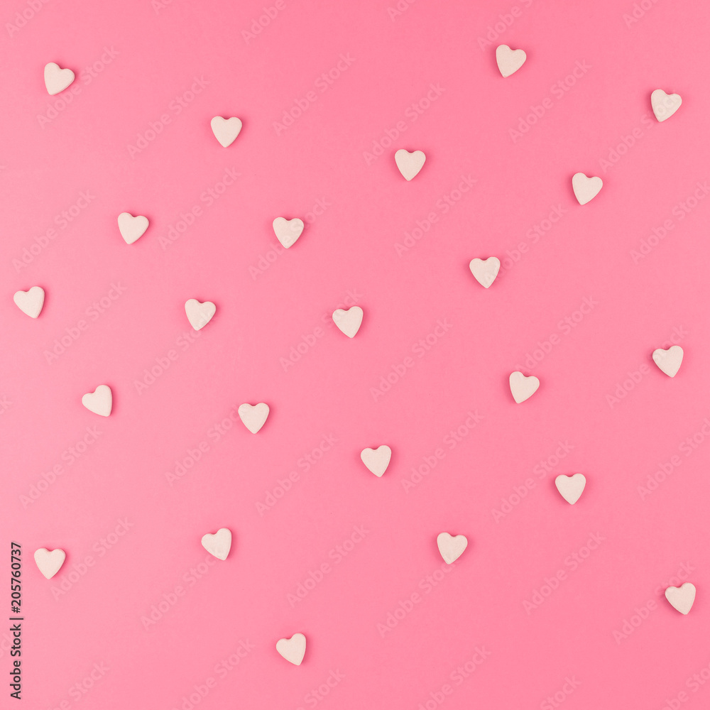Flat lay of pink heart shaped candies Flat lay of pink heart shaped candies