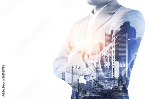 Double exposure of a Businessman wearing suit and a modern city  building of Asia Business financial district and commercial in bangkok thailand