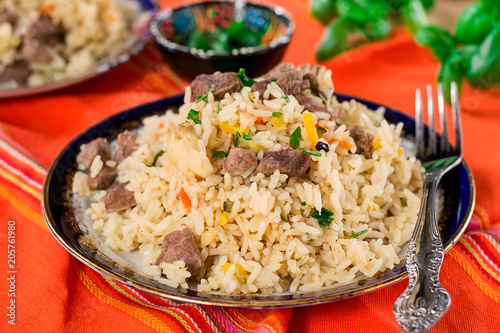 Pilaf style rice and lamb with carrots and garlic