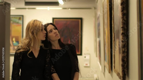 two girls, blonde and brunette in the picture gallery