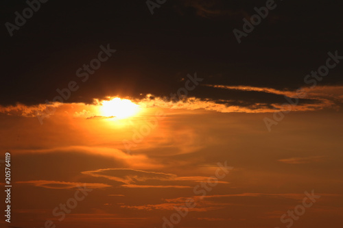 Fototapeta Naklejka Na Ścianę i Meble -  Sunset with dark clouds in thialand