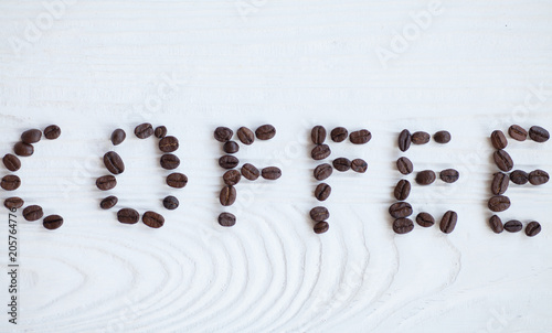 I Love Coffee phrase spelled out of roasted coffee beans isolated on white background