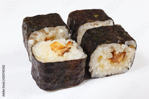 Sushi with eel and mushrooms on a white background close up.