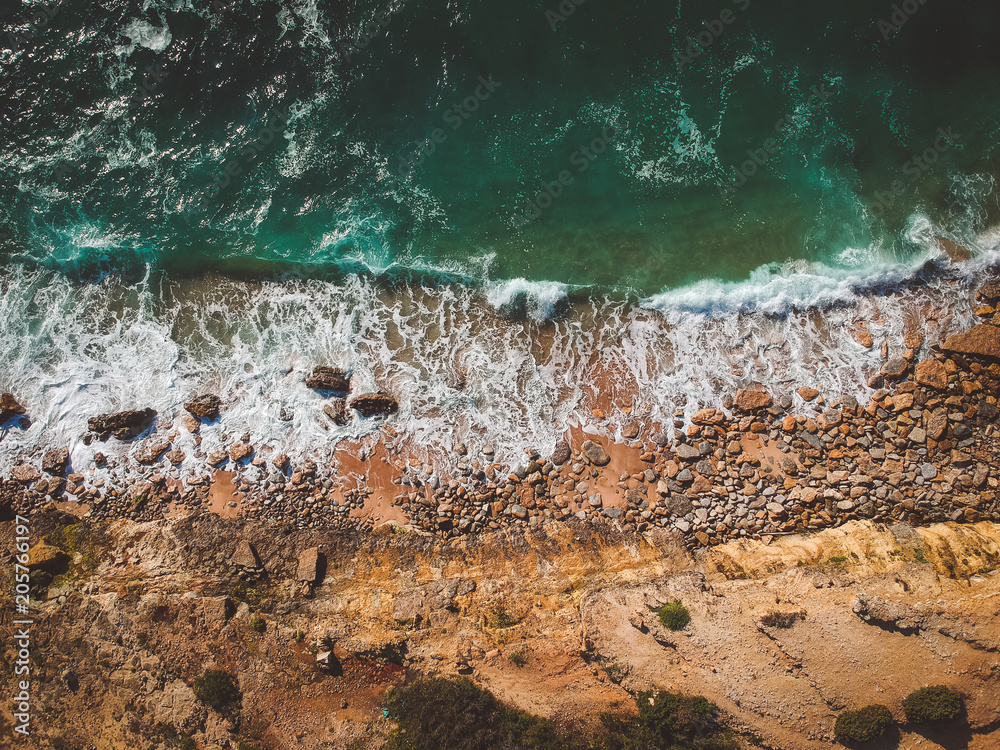 Aerial view of ocean waves and fantastic Rocky coast Aerial view of ocean waves and fantastic Rocky coast