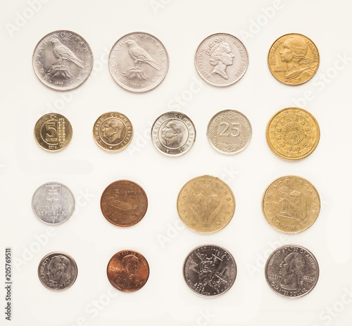 Set of coins of different countries on white