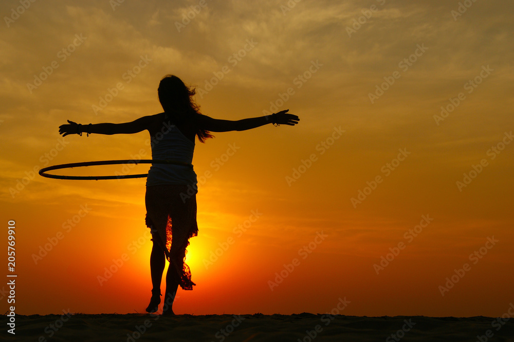 silhouette of a dancing woman silhouette of a dancing woman
