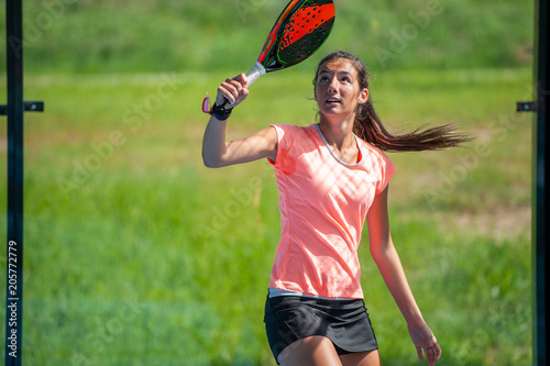Fototapeta Naklejka Na Ścianę i Meble -  young woman training paddle tenis