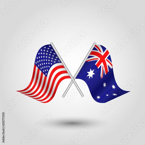 vector two crossed american and australian flags on silver sticks - symbol of united states of america and australia