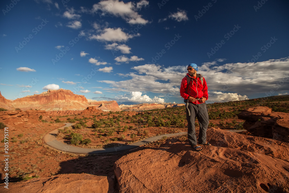 Fototapeta premium Hiker in Capitol reef National park in Utah, USA