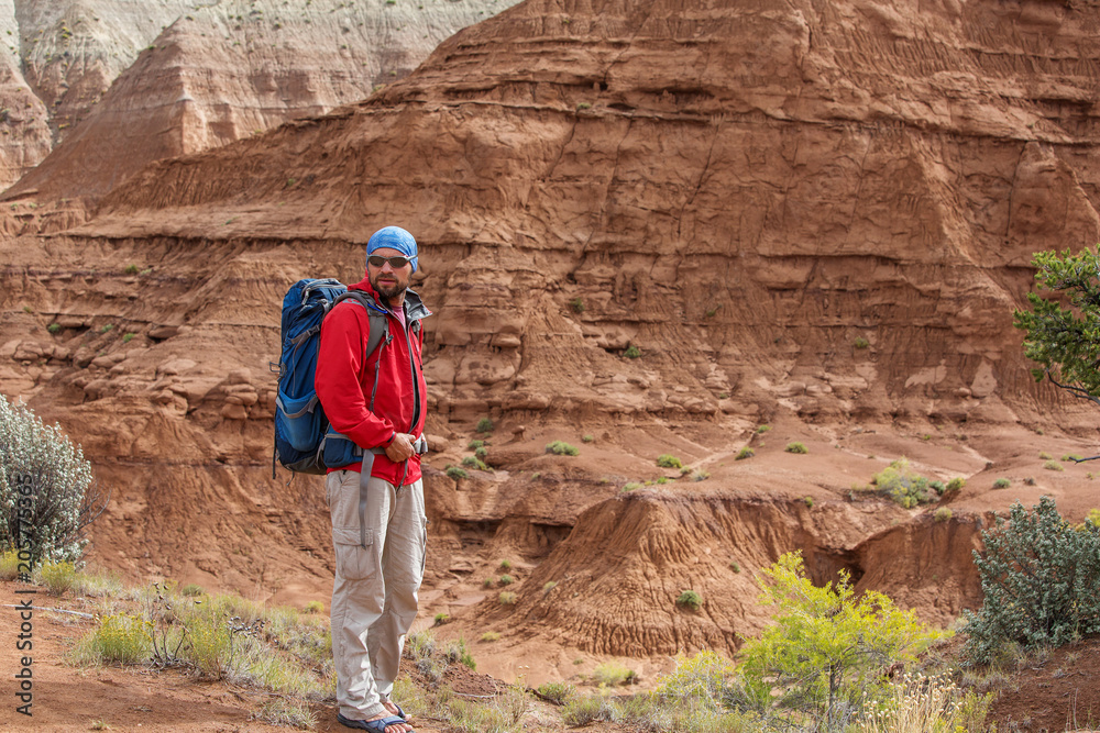 Hiker in Kodachrome Basin state park in Utah, USA Hiker in Kodachrome Basin state park in Utah, USA