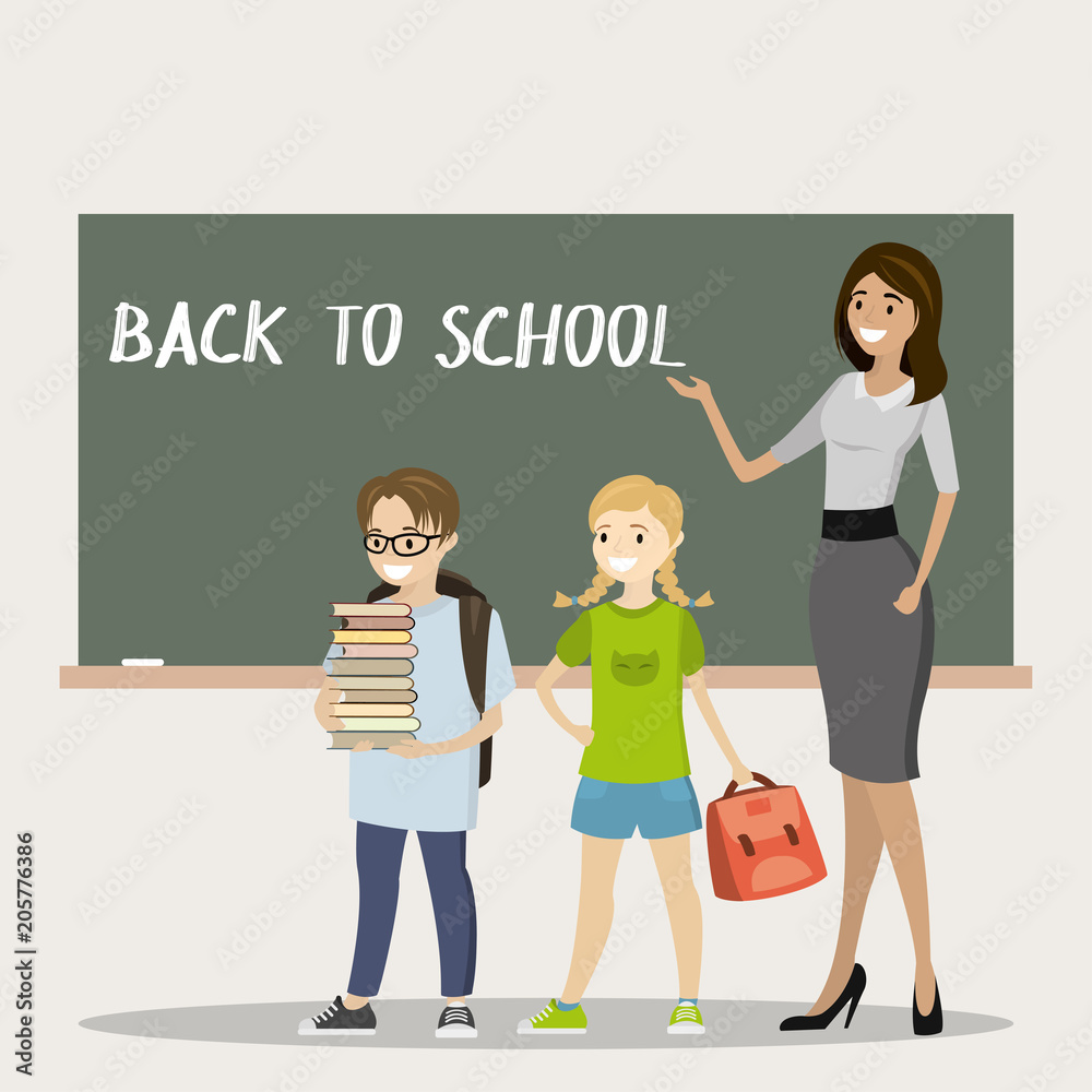 Caucasian female teacher,schoolboy and schoolgirl in classroom Caucasian female teacher,schoolboy and schoolgirl in classroom