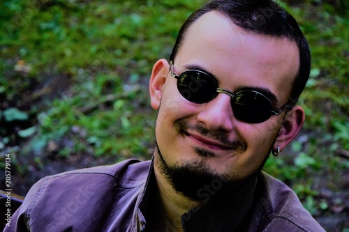 young men with sunglasses and crazy smile