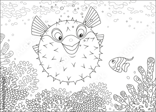 Exotic puffer fish and a butterflyfish swimming among corals on a reef in a tropical sea, black and white vector illustration in a cartoon style for a coloring book