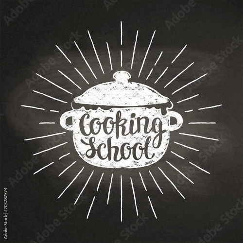 Boiling pot chalk silhoutte with sun rays and lettering - Cooking school - on blackboard. Good for cooking logotypes, bades or posters.