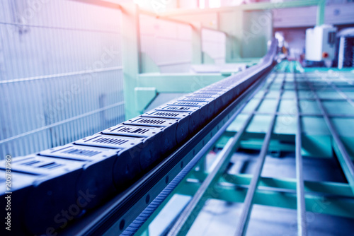 Conveyor belt for production a window pane. Industrial equipment. © romaset