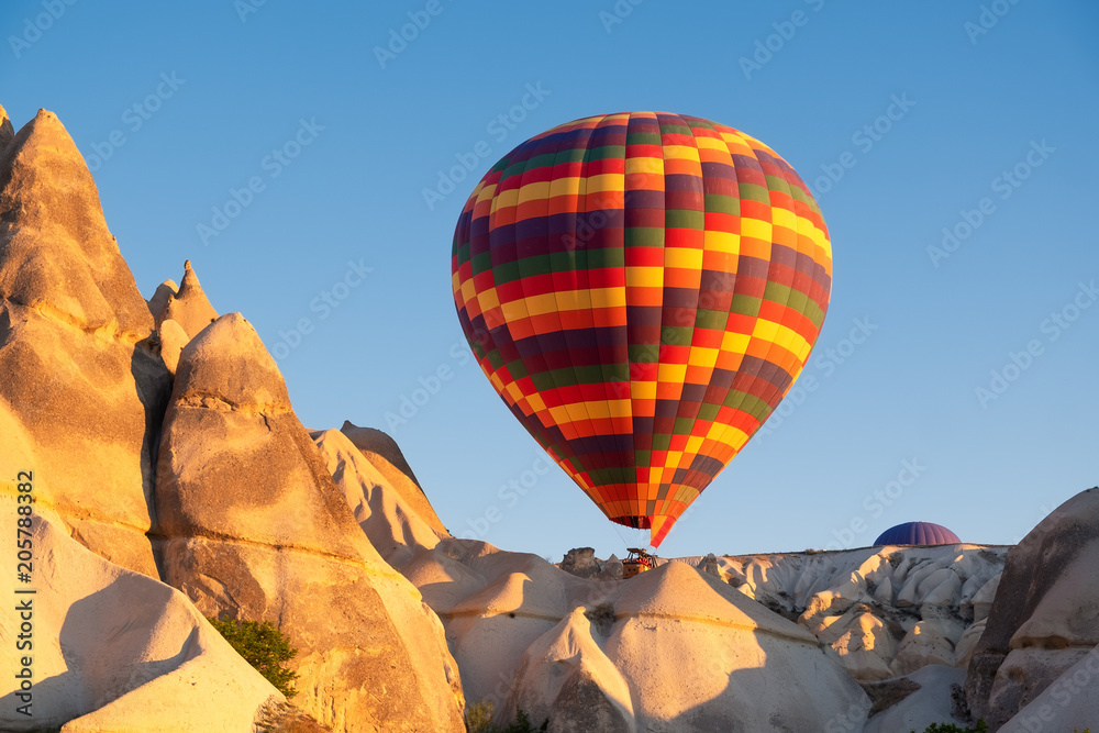 Fototapeta premium Airballon adove high rock. Beautiful natural landscape at the summer time
