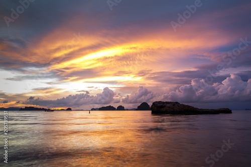 Dramatic sunset at Ao Nang Beach, Krabi, Thailand © LAMBERTOJESUS