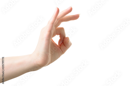 Woman hand with pale skin ok sign on white isolated background