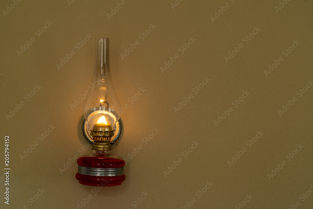 Old oil lamp on the wall Old oil lamp on the wall