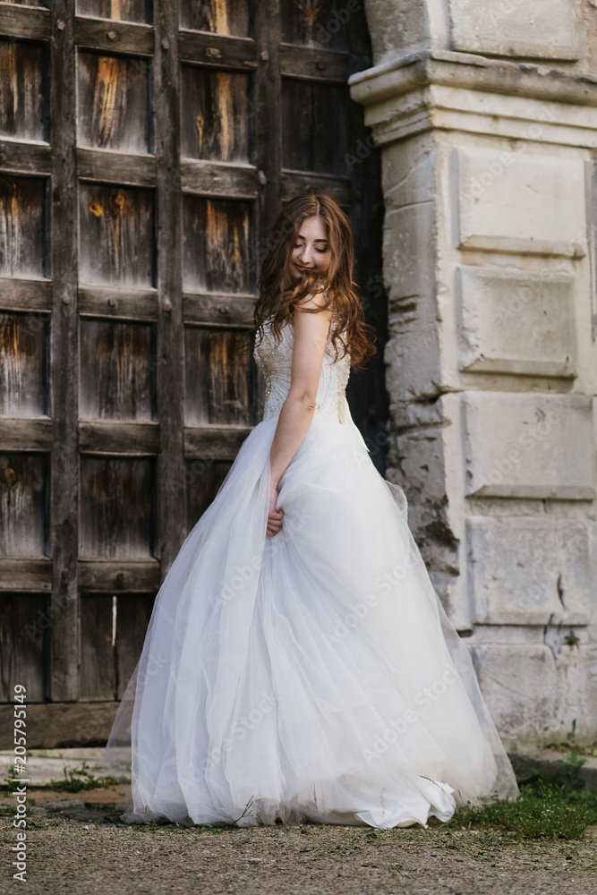 bride in wedding dress, beautiful brunette woman in national park near medieval castle, portret, bride in wedding dress, beautiful brunette woman in national park near medieval castle, portret,
