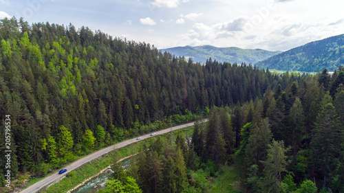 Aerial view of mountain road in summer.