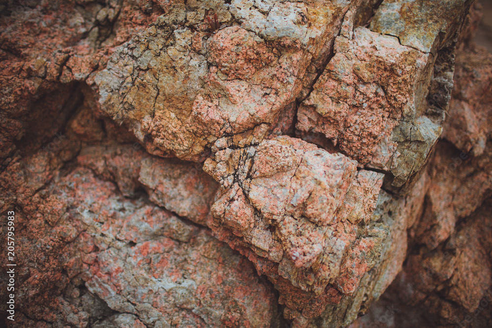 surface of the marble with brown tint, massive rocks background surface of the marble with brown tint, massive rocks background