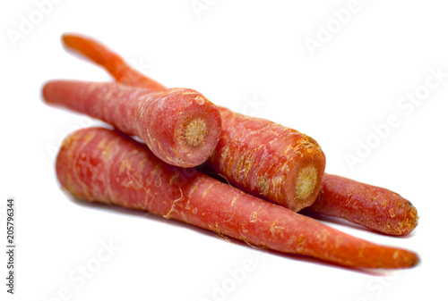 Heap of four red carrots