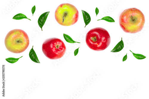 Fototapeta Naklejka Na Ścianę i Meble -  red apples decorated with green leaves isolated on white background with copy space for your text, top view