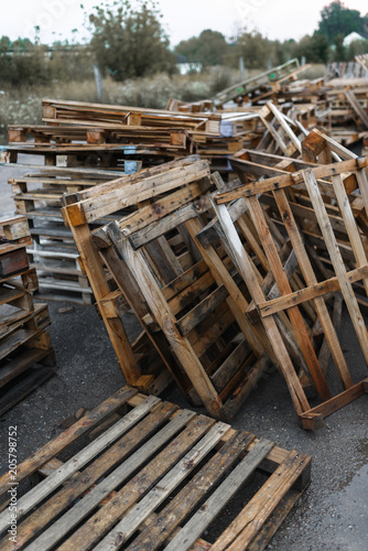 Wooden pallets in a warehouse in the forest