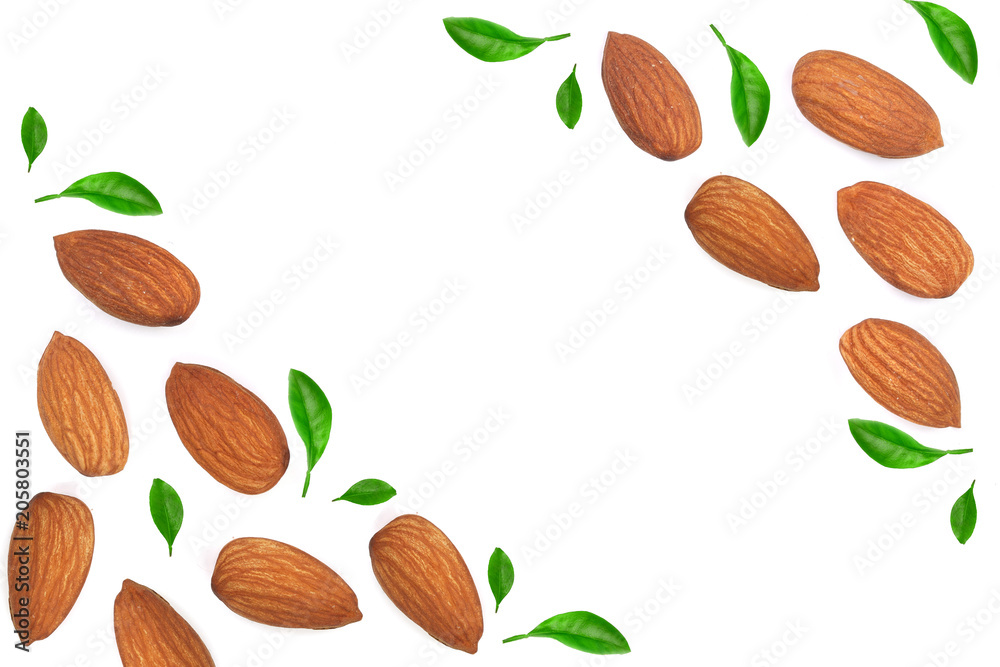 almonds decorated with leaves isolated on white background with copy space for your text. Top view. Flat lay pattern almonds decorated with leaves isolated on white background with copy space for your text. Top view. Flat lay pattern