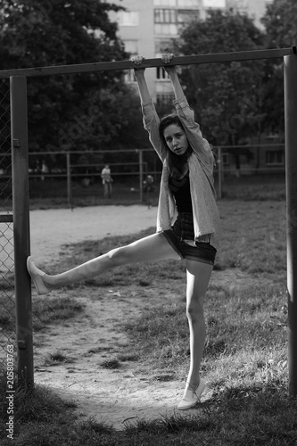 Portrait of a beautiful young girl. Joyful emotions. Black and white photo. photo