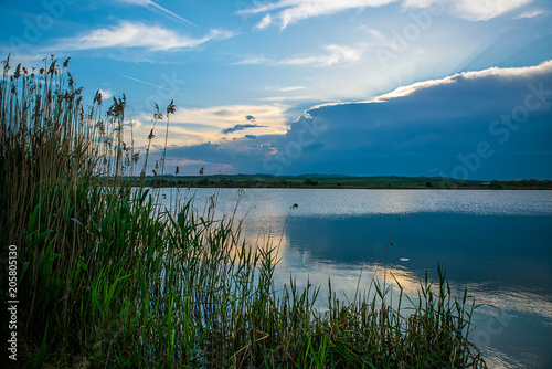 Sunset with clouds on the river