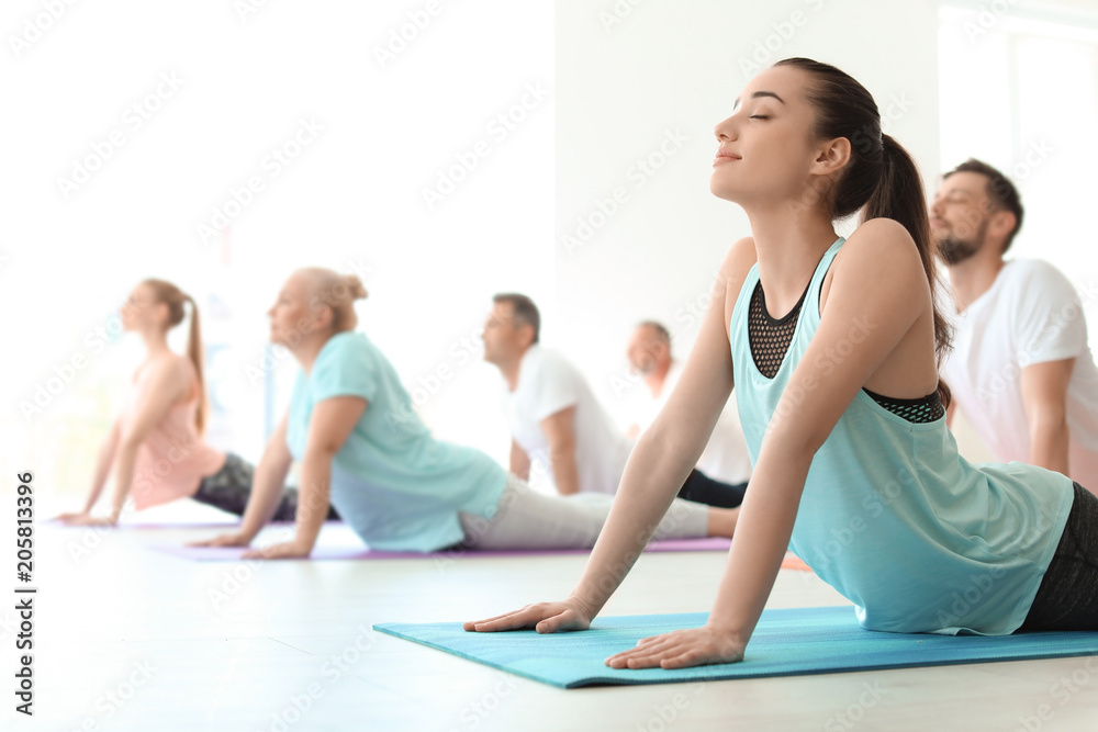 custom made wallpaper toronto digitalGroup of people in sportswear practicing yoga indoors
