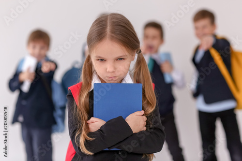 Children bullying their cla...
