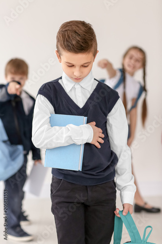 Children bullying their cla...