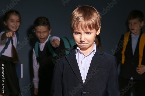 Children bullying their cla...
