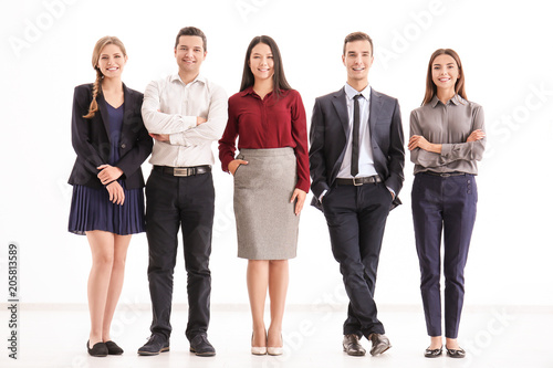 People standing together on light background. Unity concept