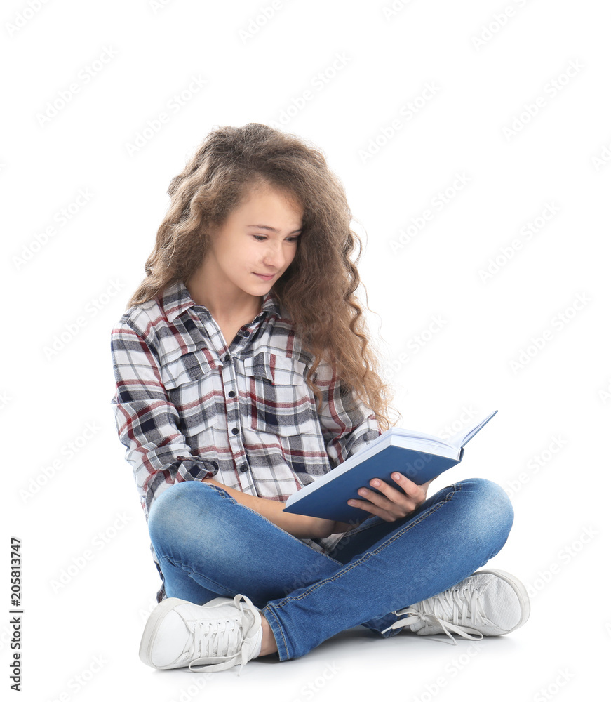 Stylish teenager reading book on white background Stylish teenager reading book on white background