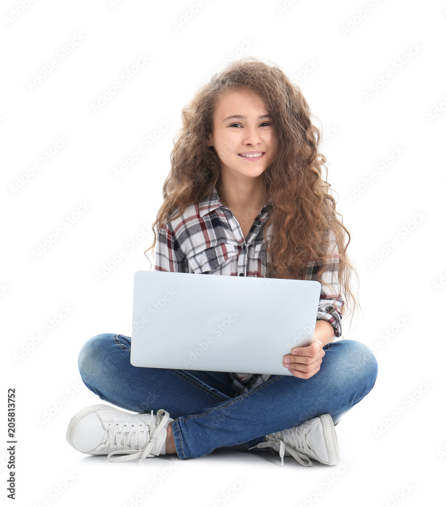 Stylish teenager using laptop against white background Stylish teenager using laptop against white background