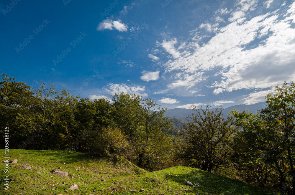 Beautiful landscape in the mountains with the sun at dawn. Mountains at the sunset time. Azerbaijan, Talish Mountains. Yardimli Beautiful landscape in the mountains with the sun at dawn. Mountains at the sunset time. Azerbaijan, Talish Mountains. Yardimli