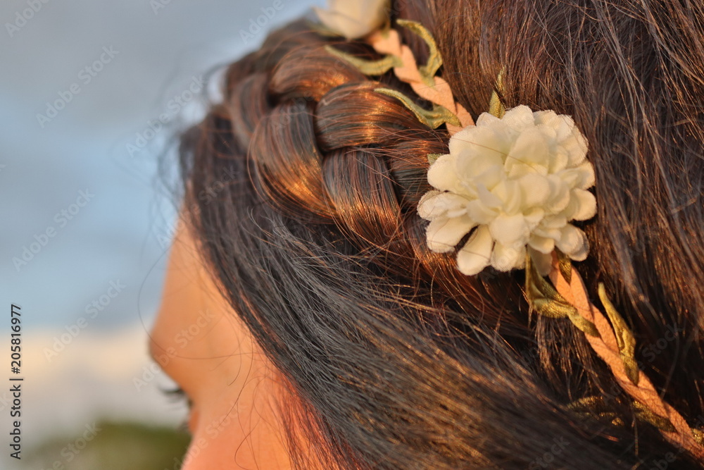 Naklejka premium Bavarian hairstyle with flower